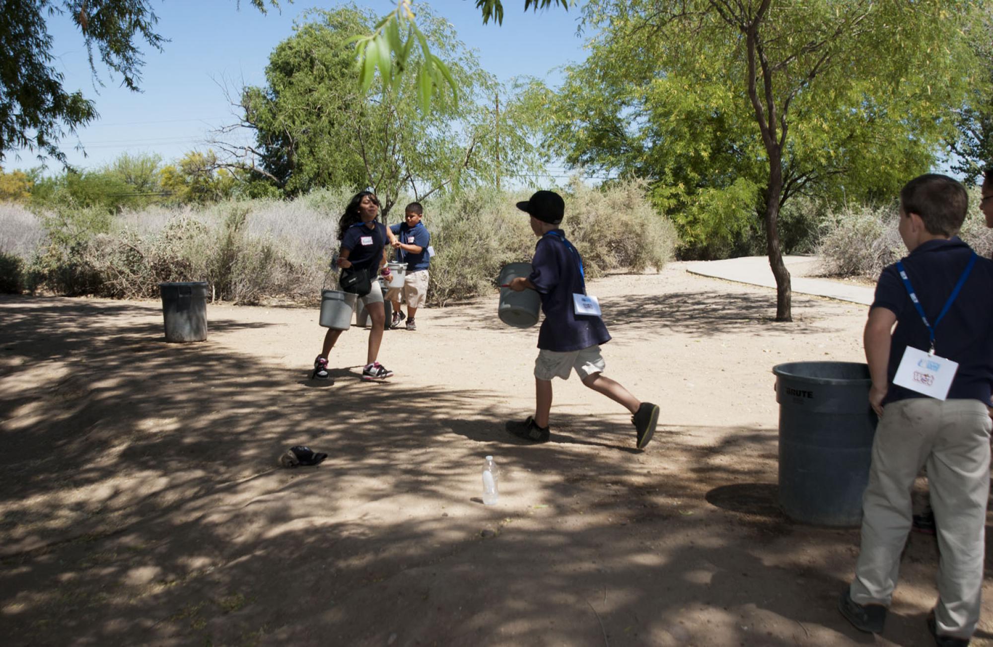 Photo of Students Doing Relay at Water Conservation Technology Station at Sweetwater Wetlands