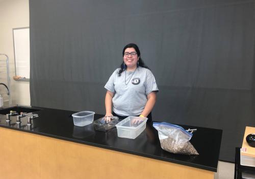 Photo of Arizona Project WET AmeriCorps Water Educator Joji Maes Filming a Groundwater Video at Pima Community College Science Learning Center