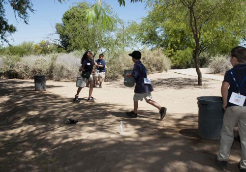 Photo of Students Doing Relay at Water Conservation Technology Station at Sweetwater Wetlands